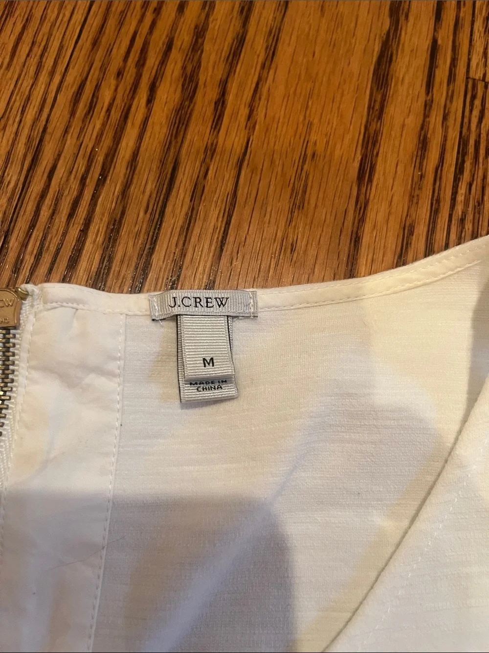 J. Crew Ivory Sleeveless Peplum Top
